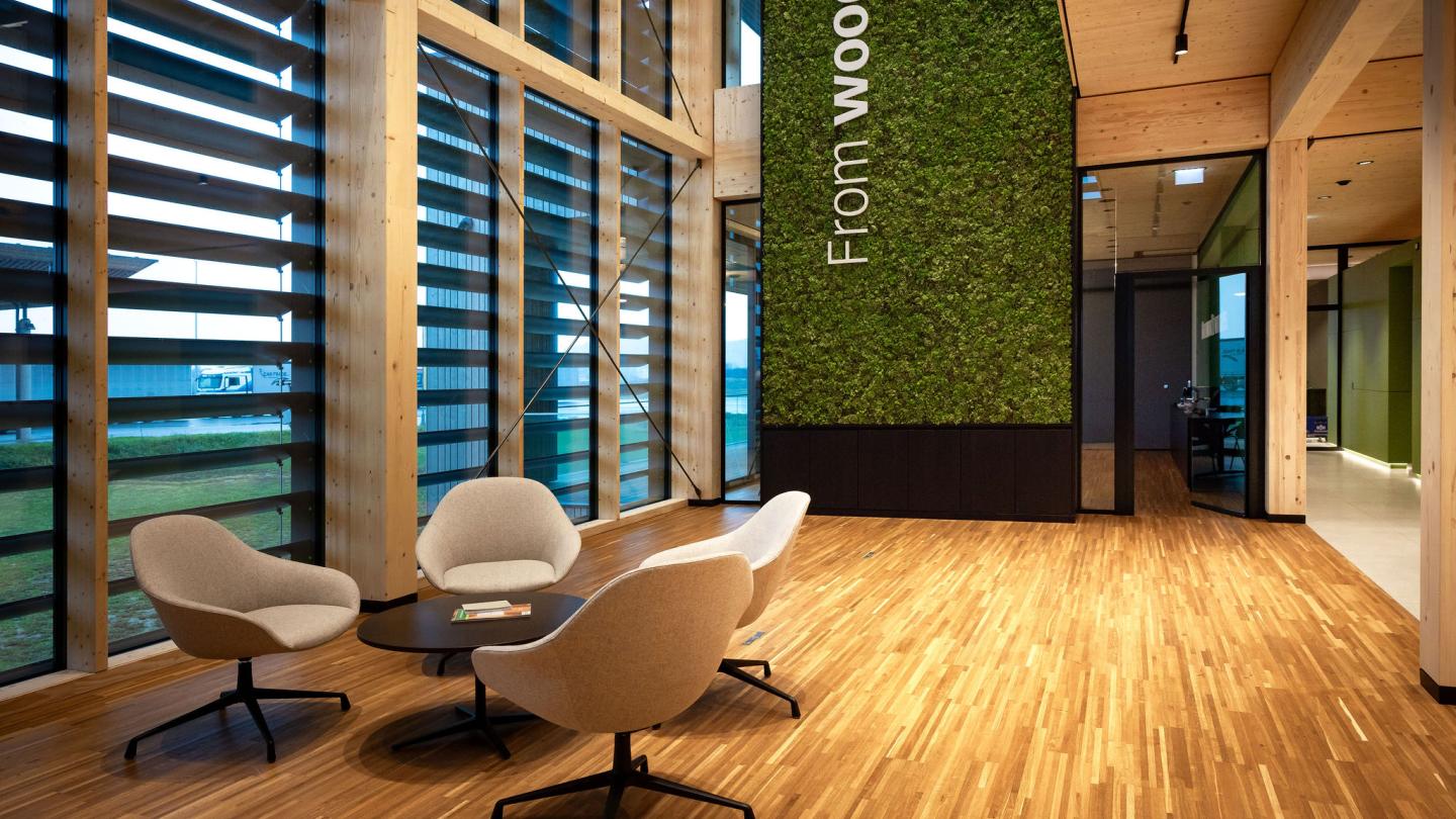 The new office building of HASSLACHER PREDING Holzindustrie, entrance area seating corner