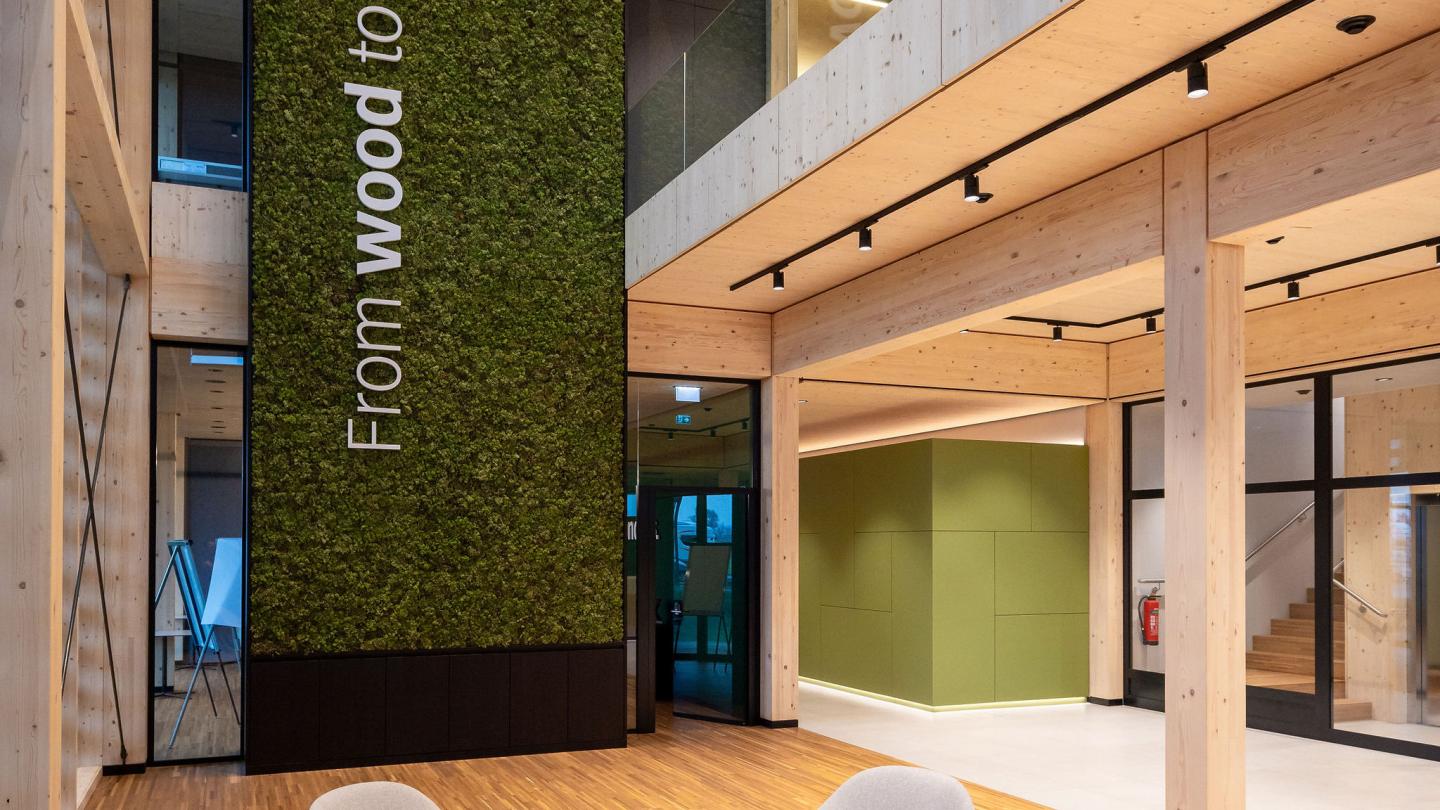 The new HASSLACHER PREDING Holzindustrie office building, entrance seating area