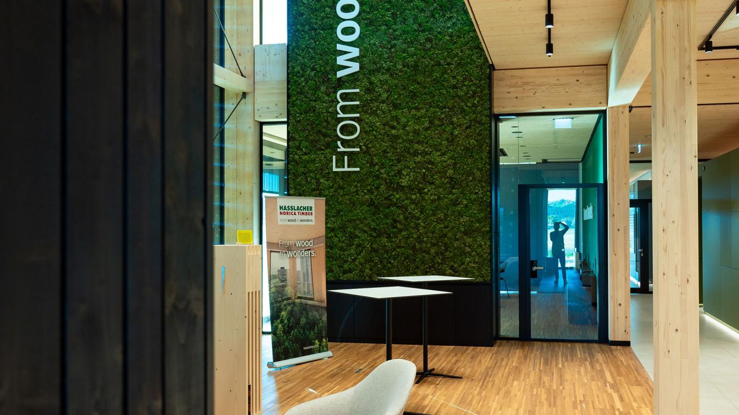 The new office building of HASSLACHER PREDING Holzindustrie, interior entrance with seating area